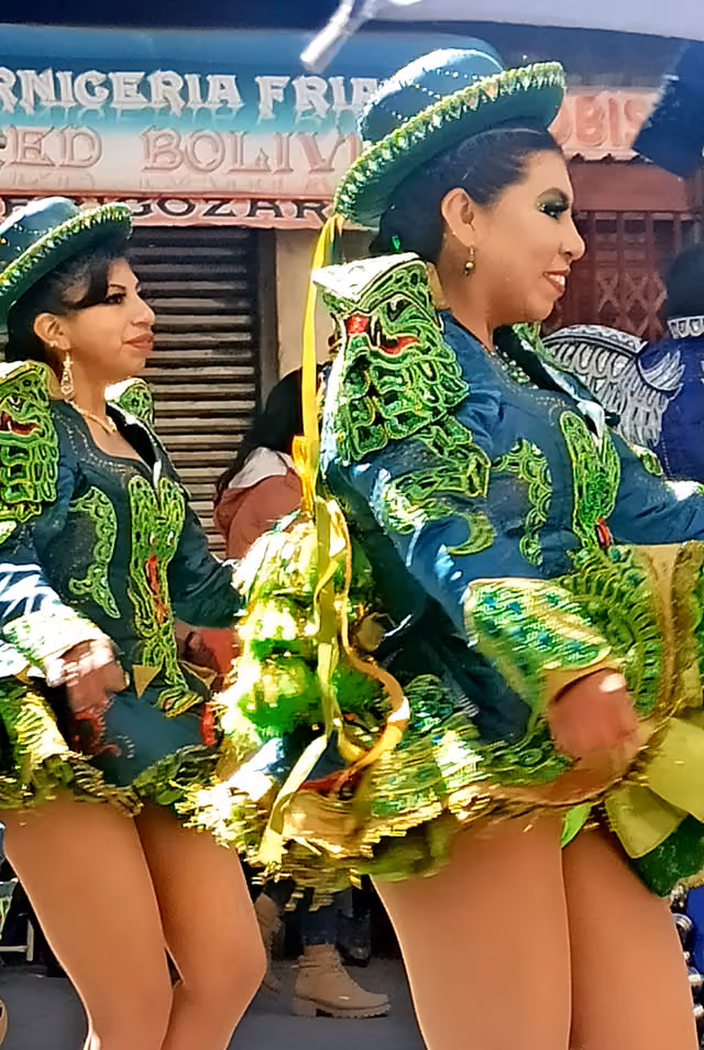 Caporal dancers with reptile details on the costume (Gran Poder, La Paz 2023)