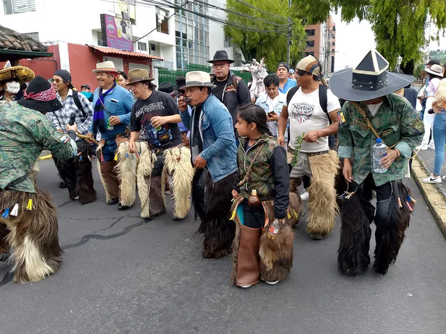 Dancers and musicians in the streets of Quito during Inti Raymi