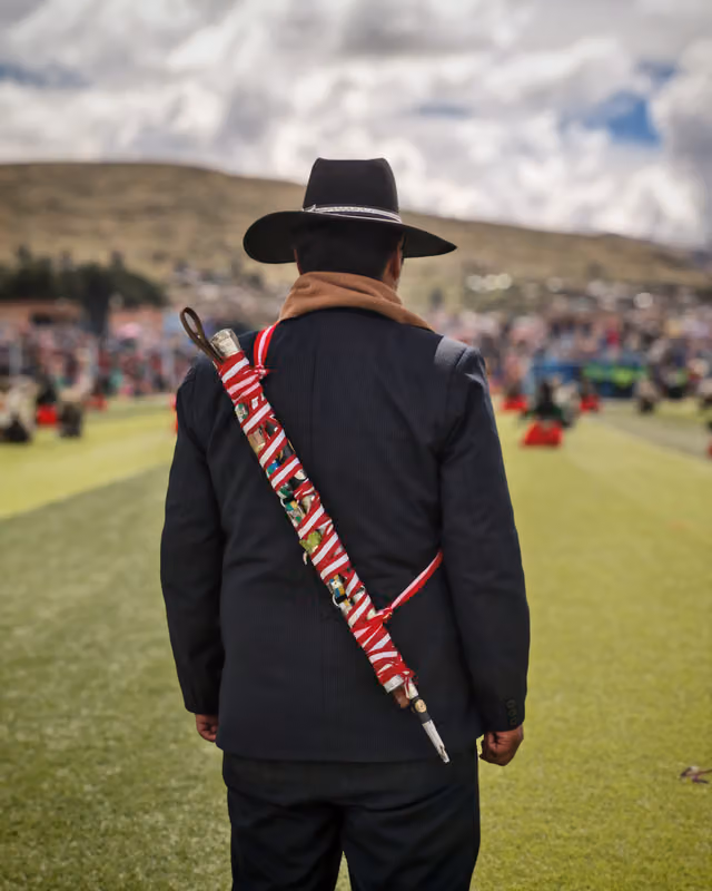Aymara communal authority at the Jach'a Anata Phunchawi (Ácora 2025)