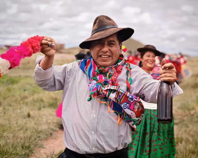 Playing the tarkas at carnival in the Chingora community, Puno