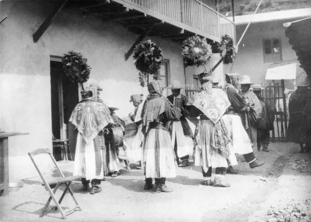 Quechua dancers in festive dress in Pelechuco