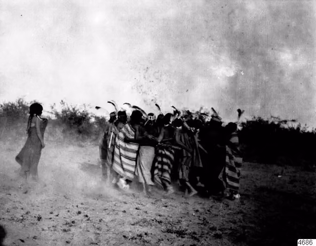 Group of Nivaclé Indians dancing on the Pilcomayo