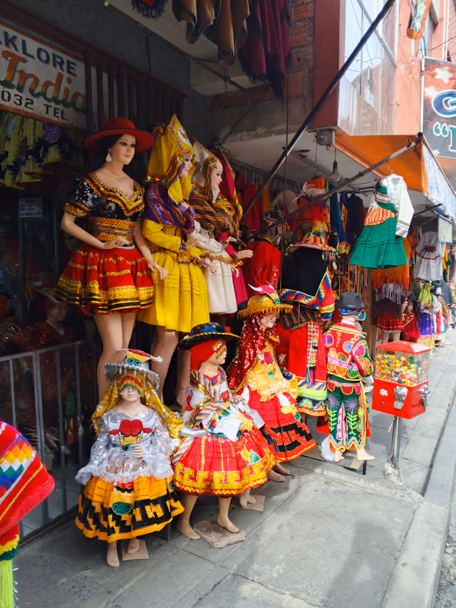 Costumes of Bolivian folkloric dances, Los Andes street, La Paz