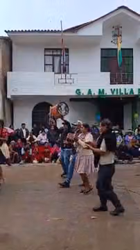 Comparsa entering the Villa Rivero square