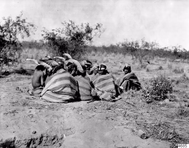 Nivaclé dancers resting, Pilcomayo river