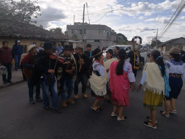 A troupe of dancers and musicians in Imbabura, Ecuador