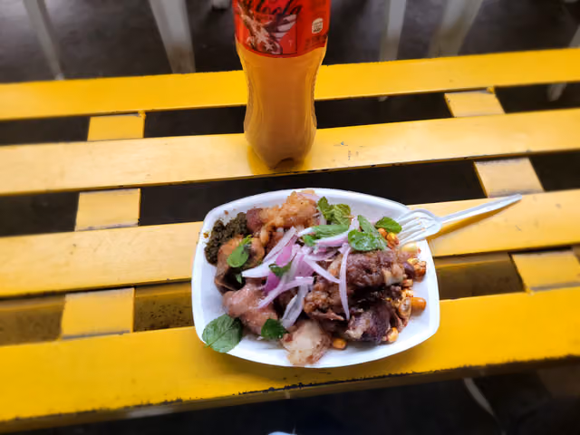 Chicharrón and chicha de jora