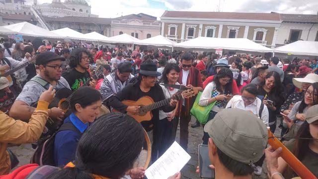 Indigenous people dance at Inti Raymi in Quito