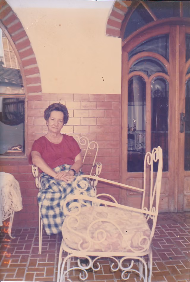 Gladys Moreno in the courtyard of her house