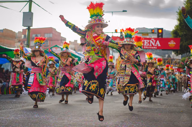 Tinku dancers jumping in the street (Bolivian carnival)