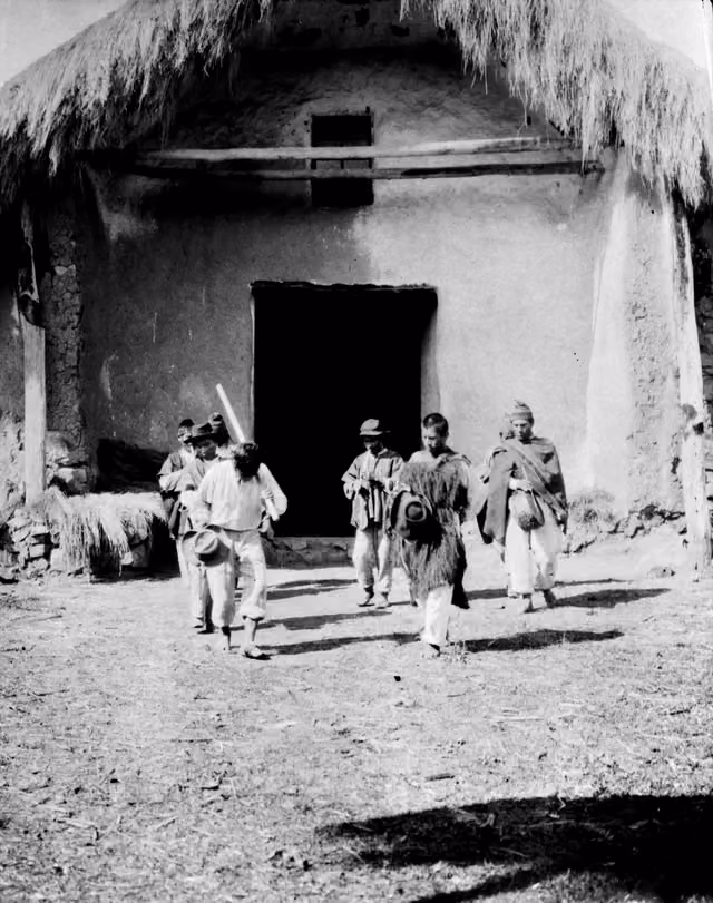 Indigenous people dancing outside a church, Moxos Province, Bolivia (c. 1905)
