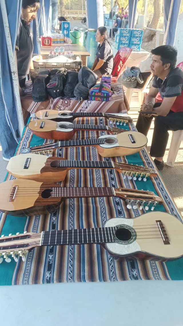 Charangos on display and artisans at the III Intercultural Charango Festival in Sacaba