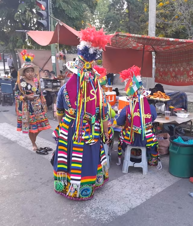 Tinku dancers resting in Cochabamba