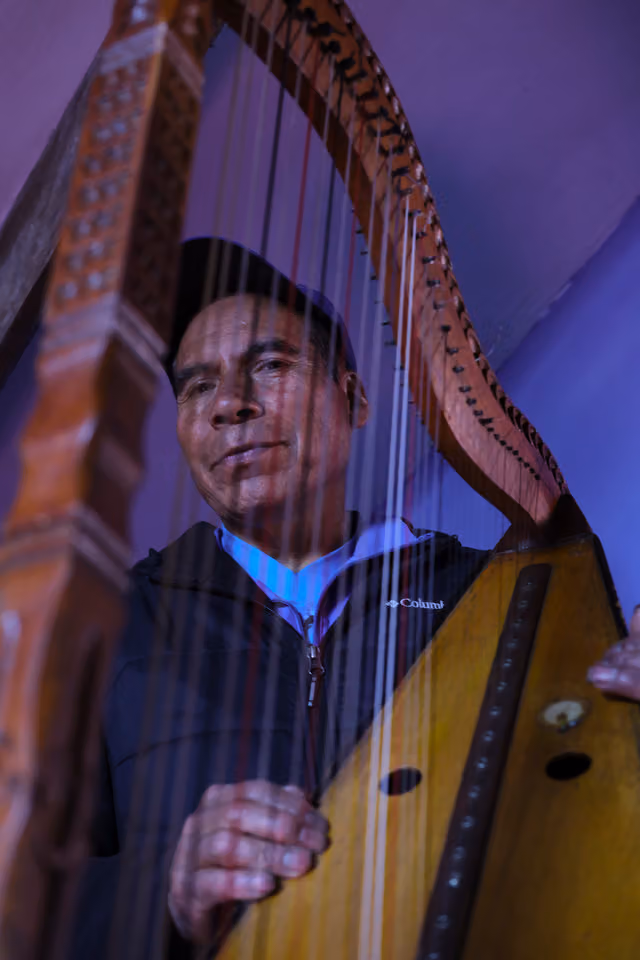Alejandro Huaman Quispe with his harp