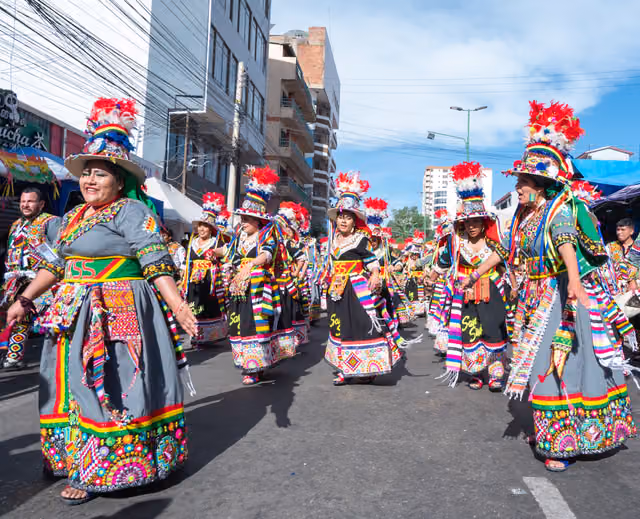 Women dancing tinku in traditional costume, Cochabamba corso