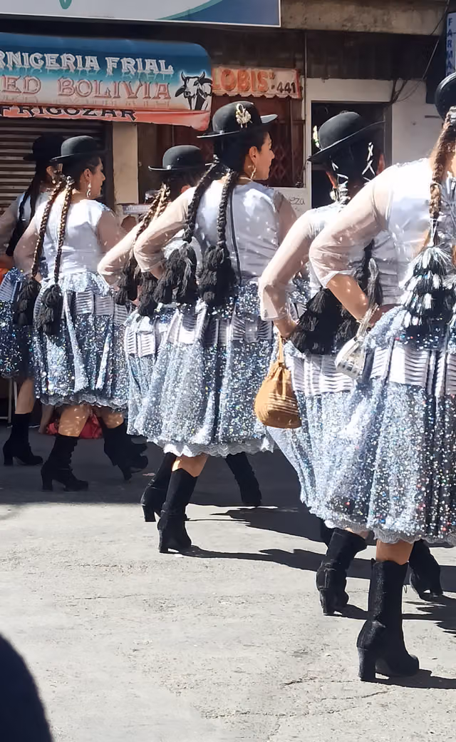 Morenada dancers in shining costumes, Gran Poder