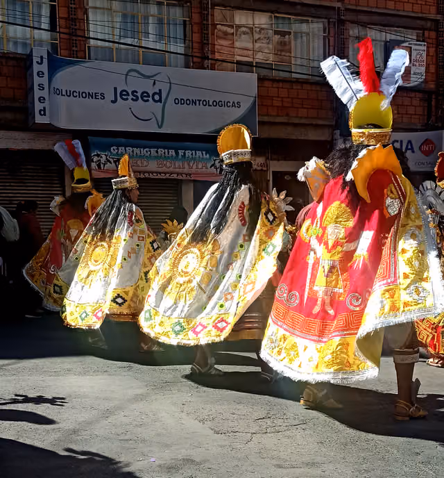 Inca dancers in layered costumes