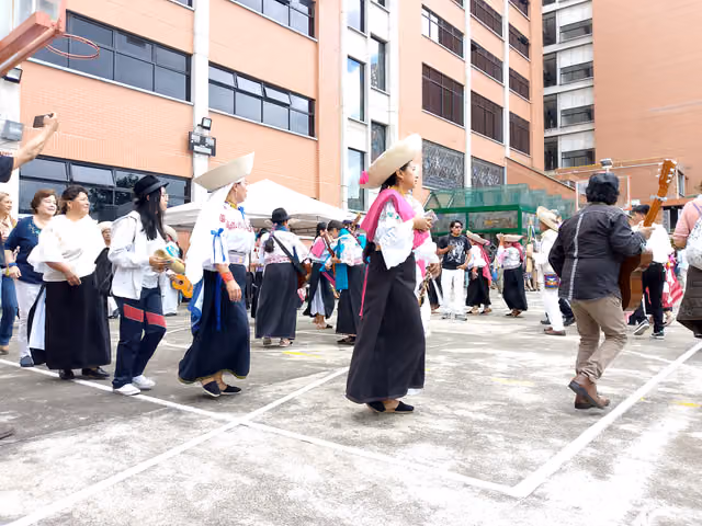Indigenous people dancing in the UASB yard, Quito