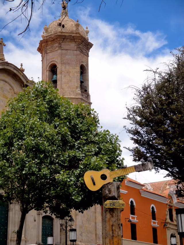 Charango monument and Potosí cathedral