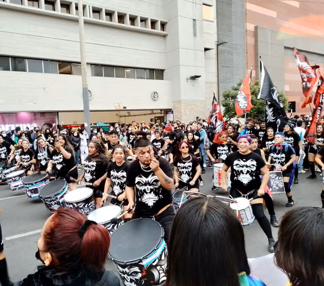 Lucha y Tambo company at the pride march