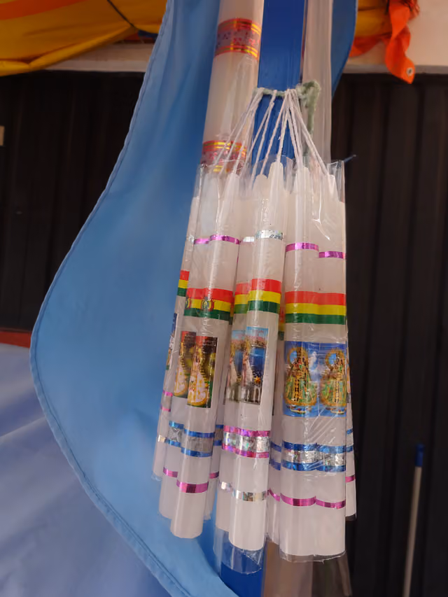 Candles with the image of the Virgin of Copacabana
