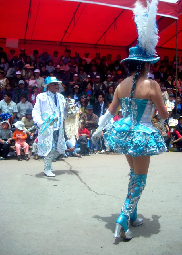 Morena lass and galán in the morenada, Puno, Peru