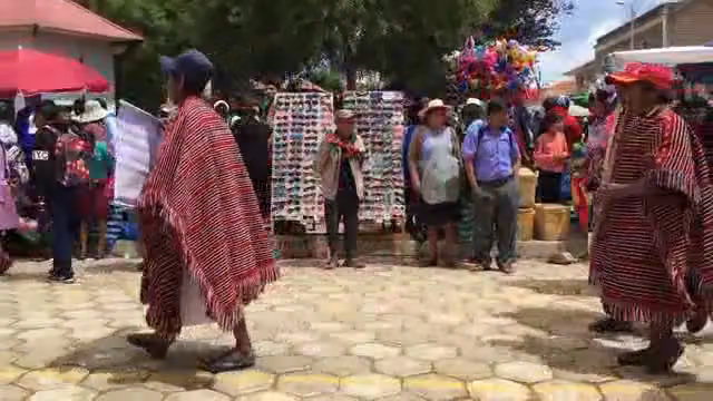 Traditional dancers parading at the Pujllay festivities in Tarabuco