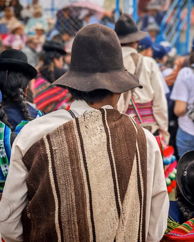 Aymara community member at the Jach'a Anata Phunchawi (Ácora 2025)