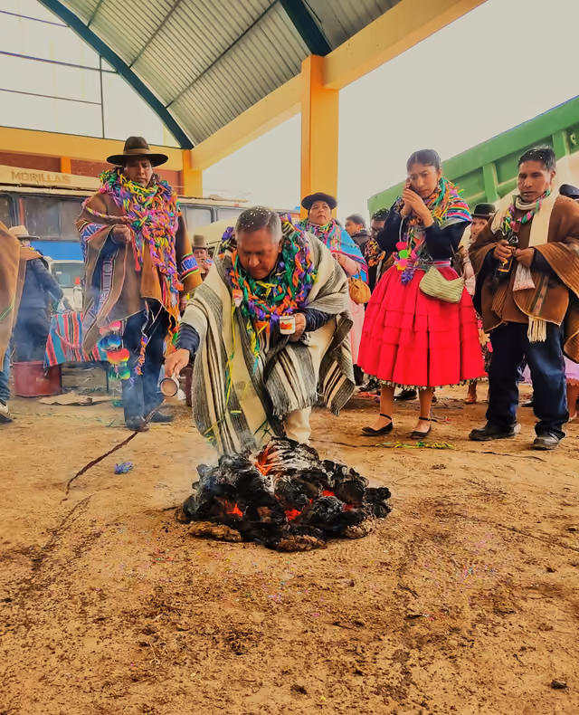 Challa offering to the earth during the Ácora carnival