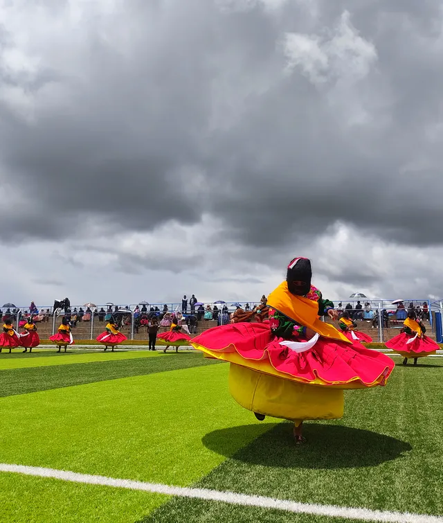 Woman dancing the Negritos de Ccacca at the Jach’a Anata Punchawi
