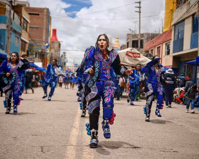 The caporales dance, machitas block